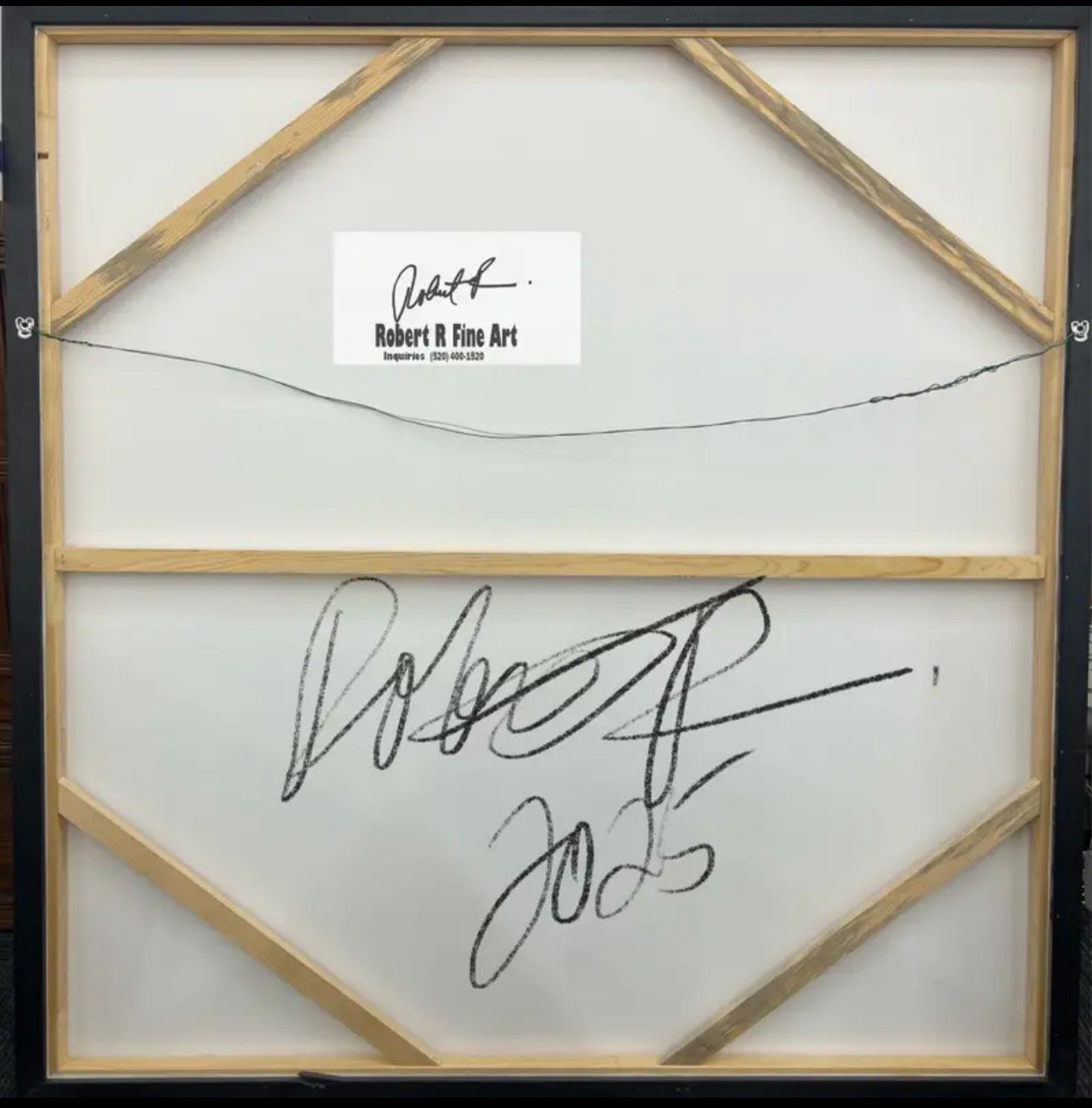 Back of a gallery-wrapped abstract painting by Robert R, showing wooden stretcher construction, hanging wire, dated artist signature, and Robert R Fine Art contact tag.